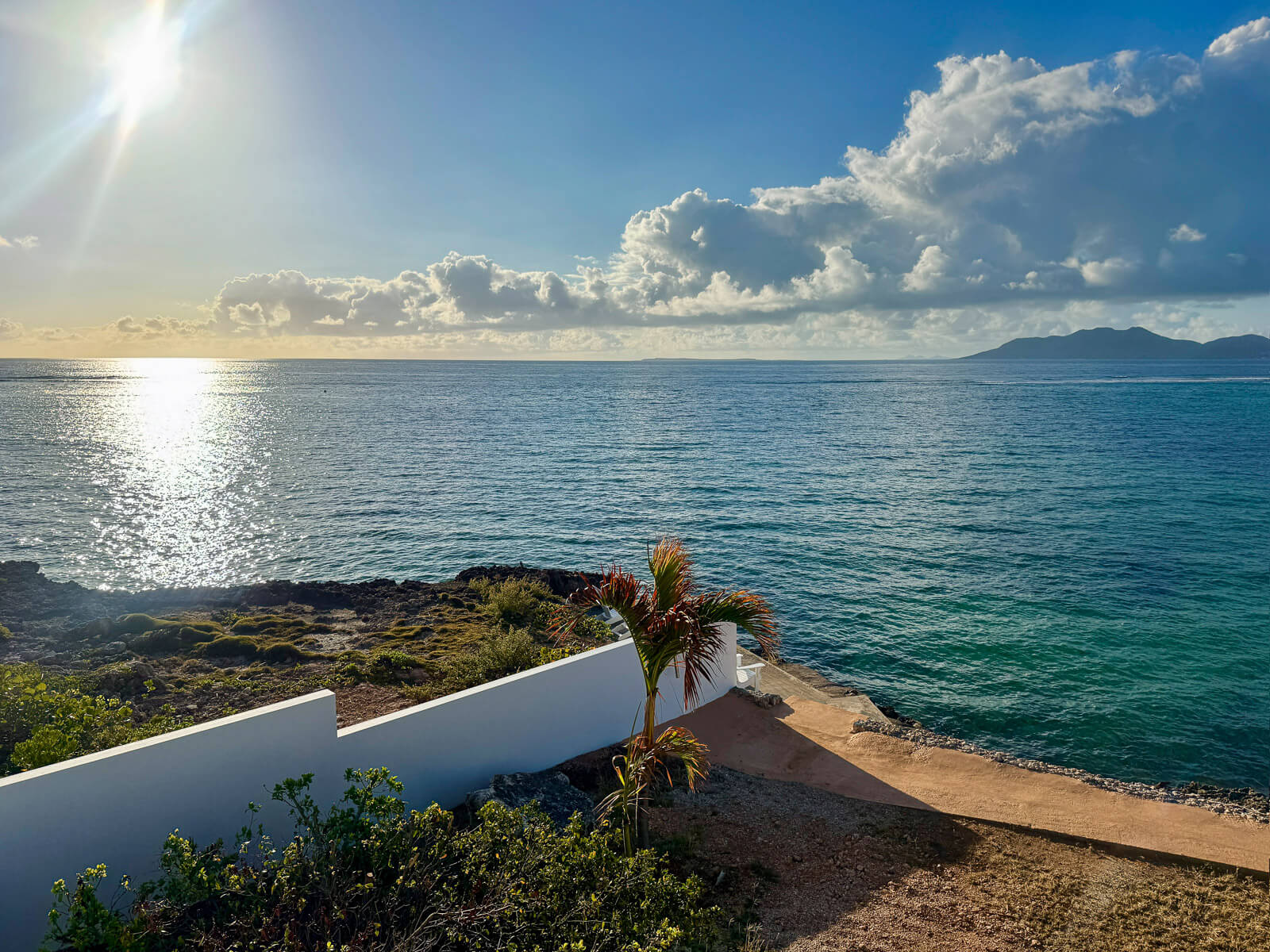 The Dock — late afternoon light on the water