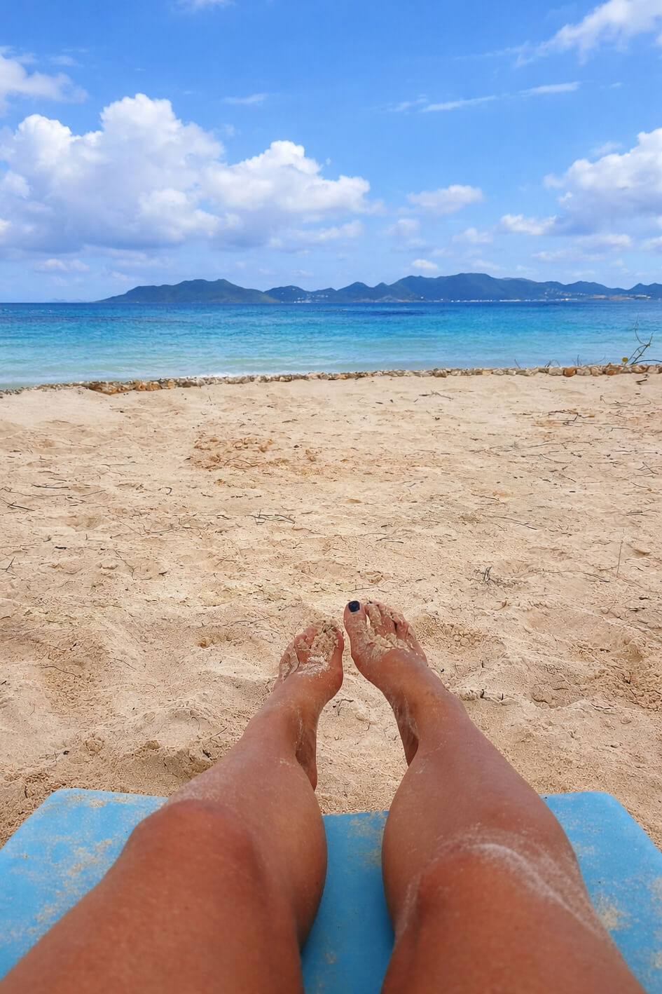 The Point — oceanfront chaise lounges and umbrellas, private stretch of sand at Villa Bénie